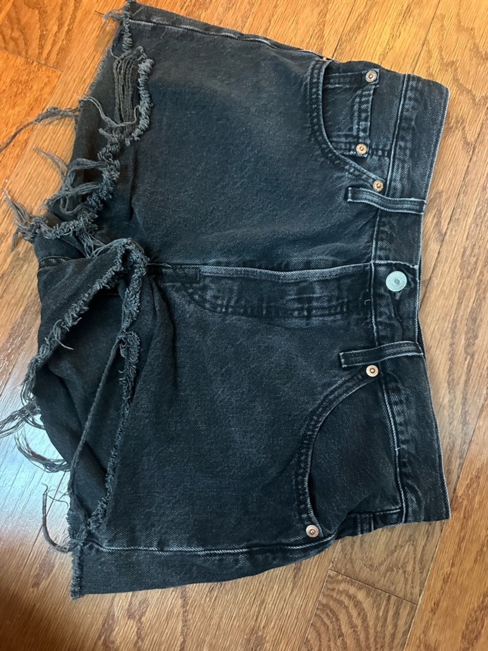 Levi’s Black Distressed Denim Cutoff Shorts